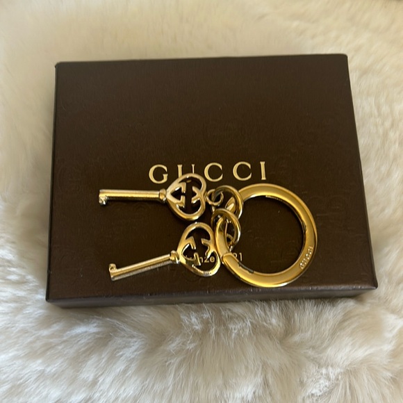 Gucci gold tone keychain with 2 key charms and box - Picture 1 of 11